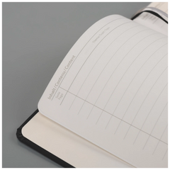 Notizbuch Kompagnon Klassik | A5, liniert, Gummizugverschluss, schwarz